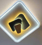 GeoGlow LED ceiling light in modern design with warm illumination and geometric shapes
