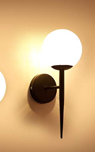 Amangazini Glass Globe Wall Light Fixture with a sleek black holder and soft white sphere