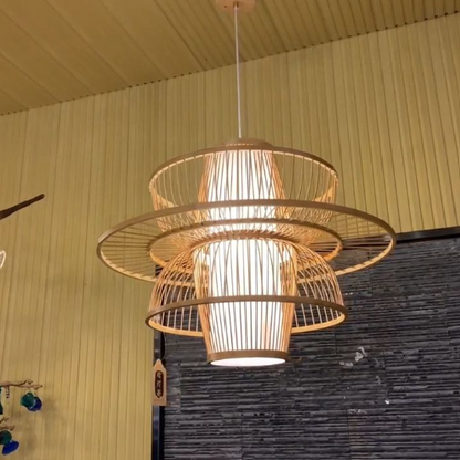 Stylish handmade bamboo pendant light featuring layered design and warm illumination for home decor