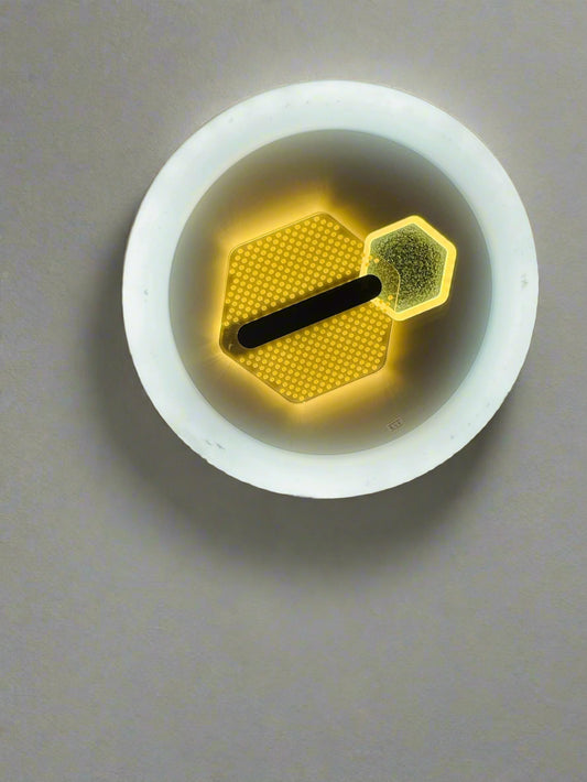 Amangazini hexagonal LED ceiling light in round fixture with modern design and warm glow