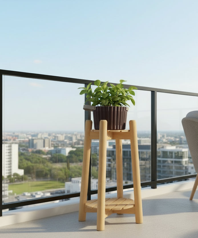Wooden plant stand with a pot of green plant indoors