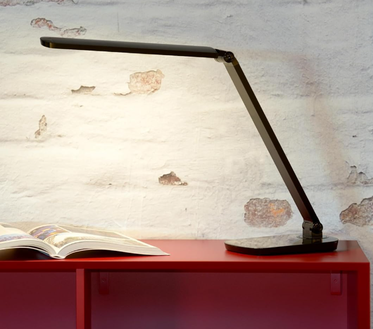 Amangazini LED Desk Lamp for Ideal Lighting on a red shelf with an open book