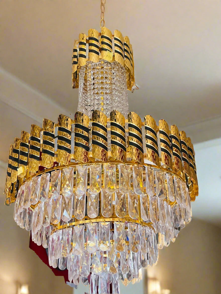 Amangazini luxury crystal chandelier with gold accents and elegant design, suitable for upscale interiors