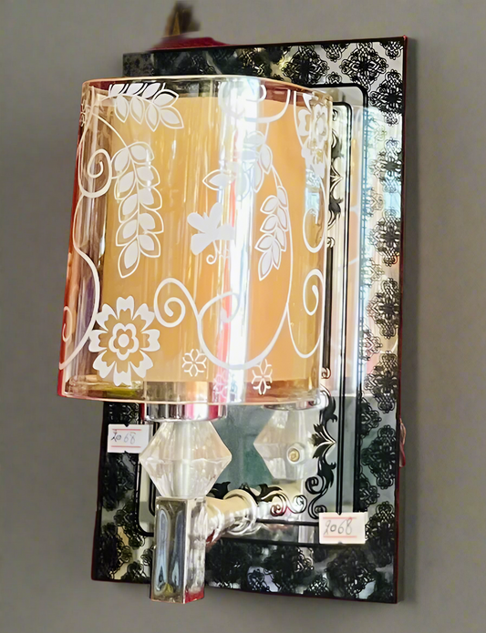 Amangazini modern floral pattern sconce featuring an elegant glass shade and decorative base