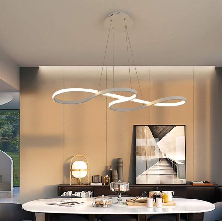 Amangazini Modern Interlocking Ring LED Chandelier hanging above a dining table with modern decor