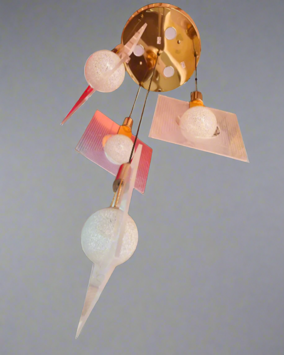 Modern ceiling light fixture with gold and pink accents on a gray background