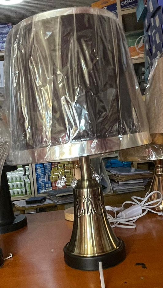 Amangazini sophisticated table lamp with decorative base and stylish shade covered in plastic