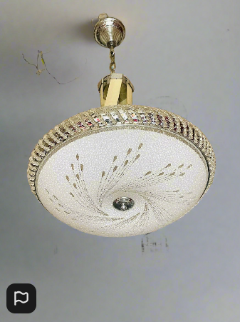 Amangazini Swirl Elegance Pendant Light with a decorative design and shimmering finish