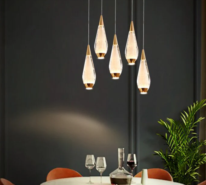 Amangazini Teardrop Pendant Lighting in Glass and Wood, perfect for modern dining spaces