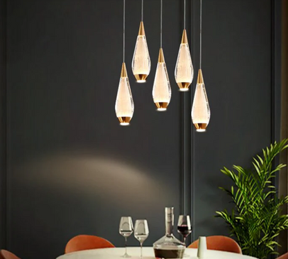 Amangazini Teardrop Pendant Lighting in Glass and Wood, perfect for modern dining spaces