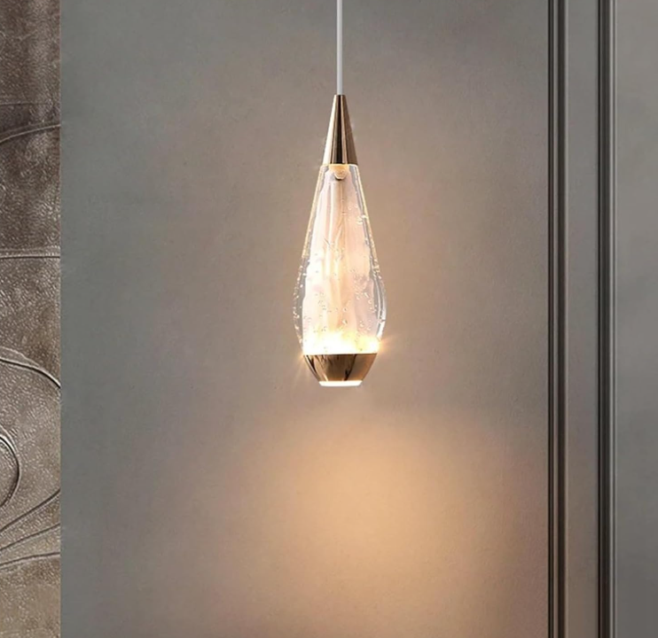 Amangazini Teardrop Pendant Lighting with a Stylish Glass Design and Warm Glow for Modern Interiors