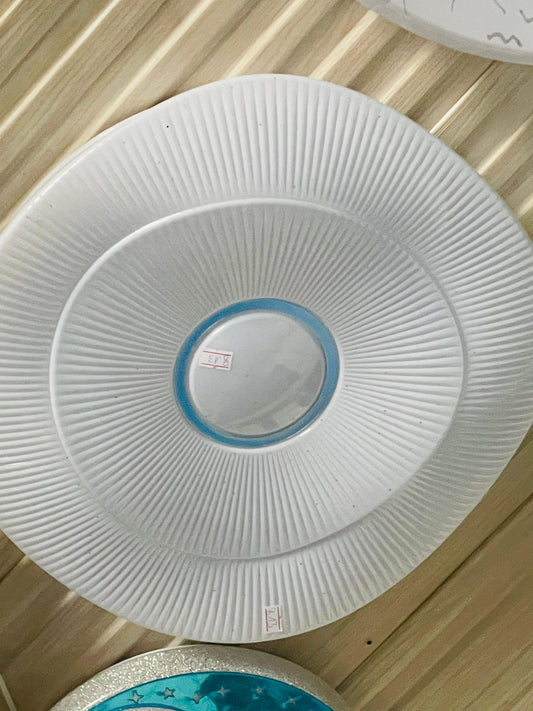 Amangazini Wave Whisper Light Decorative Plate with Textured Design and Soft Blue Center